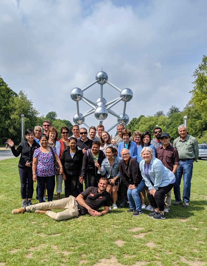 tour leader guiding a group tour in Europe