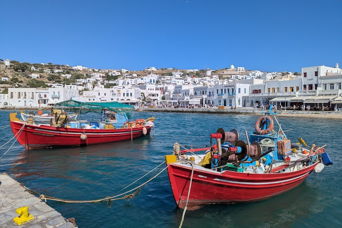 Traditional fishing boats in a harbour on the island of Mykonos