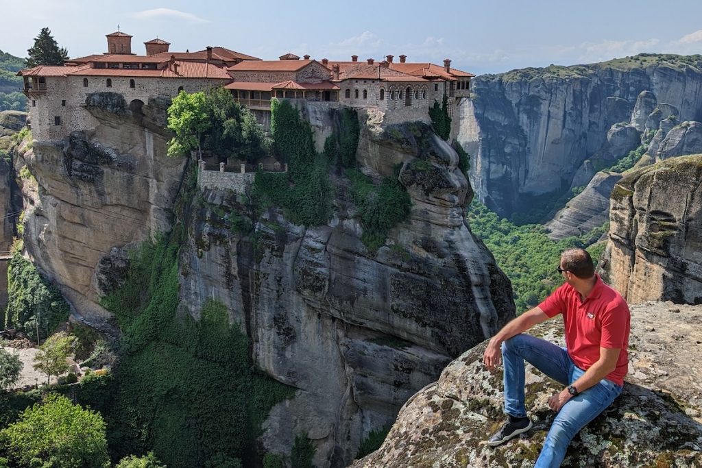 Tour Leader looking at Vaarlam Monastery in Meteora