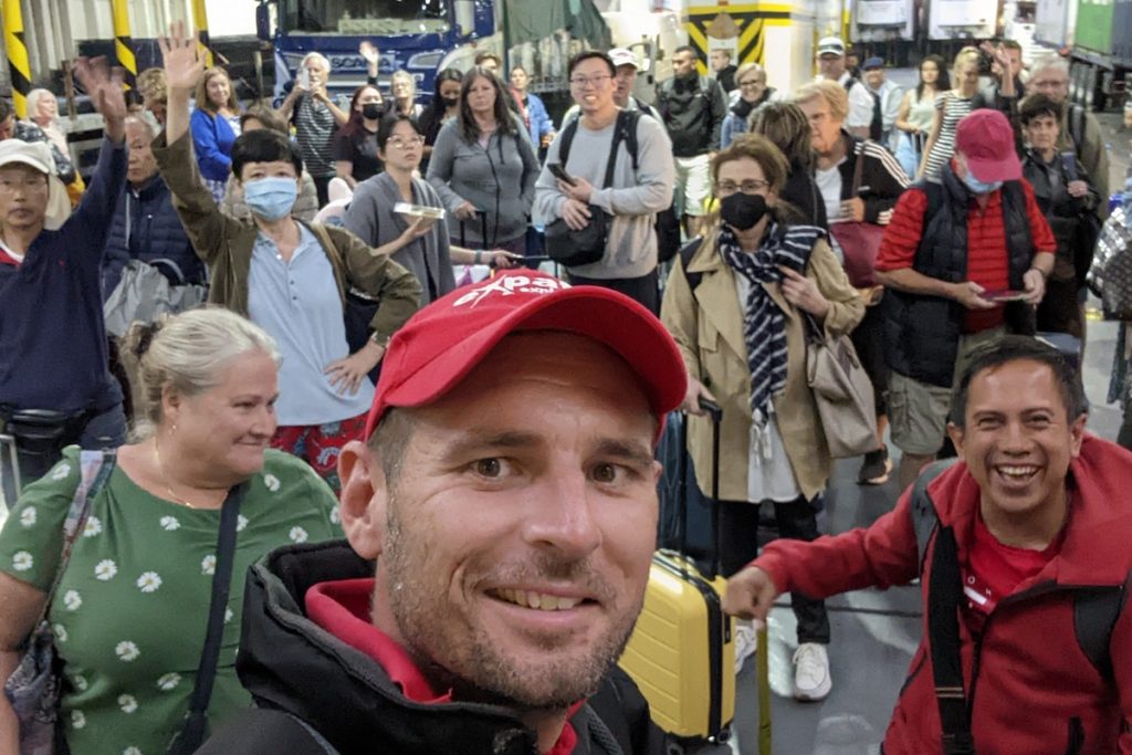 Best of Greece tour group ready to walk off the ferry in Mykonos