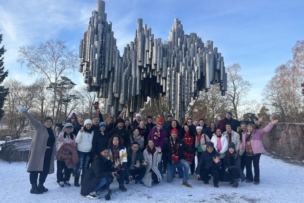 Expat Explore tour group photo Helsinki Sibelius monument