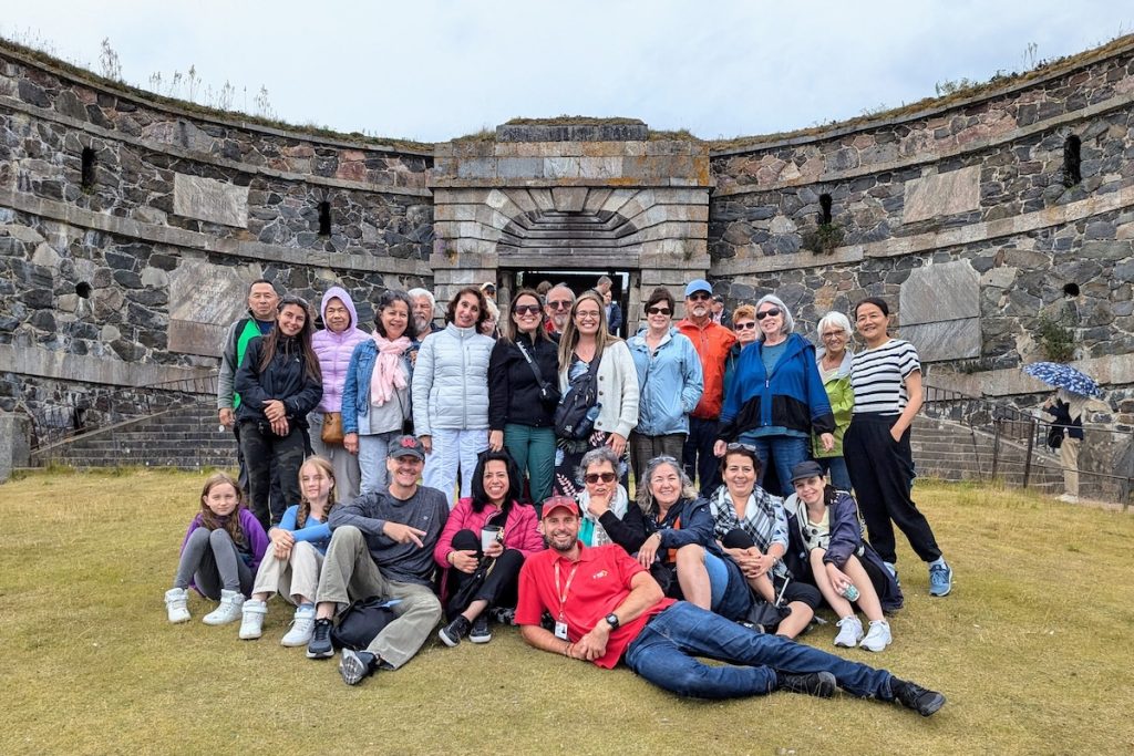 Expat Explore Best of Scandinavia & the Baltics tour group photo Suomenlinna