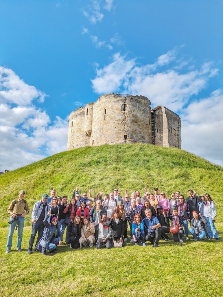 Best of UK & Ireland tour review - Expat Explore group in front of Clifford's Tower in York