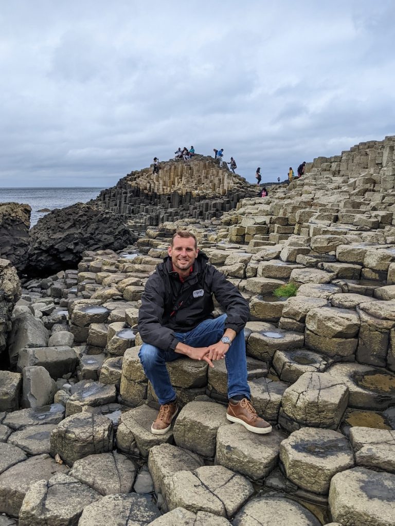 Best of UK & Ireland tour review - Expat Explore Tour Leader enjoying the Giant's Causeway