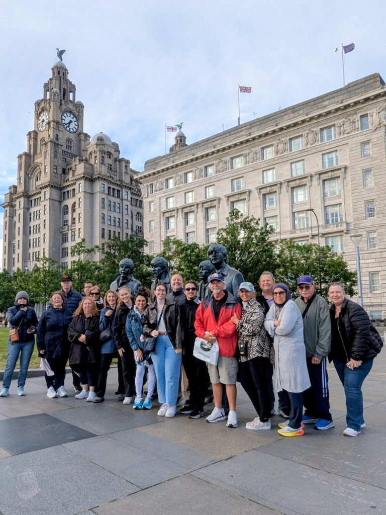 Best of UK & Ireland tour review - Expat Explore tour group posing with the Beatles in Liverpool