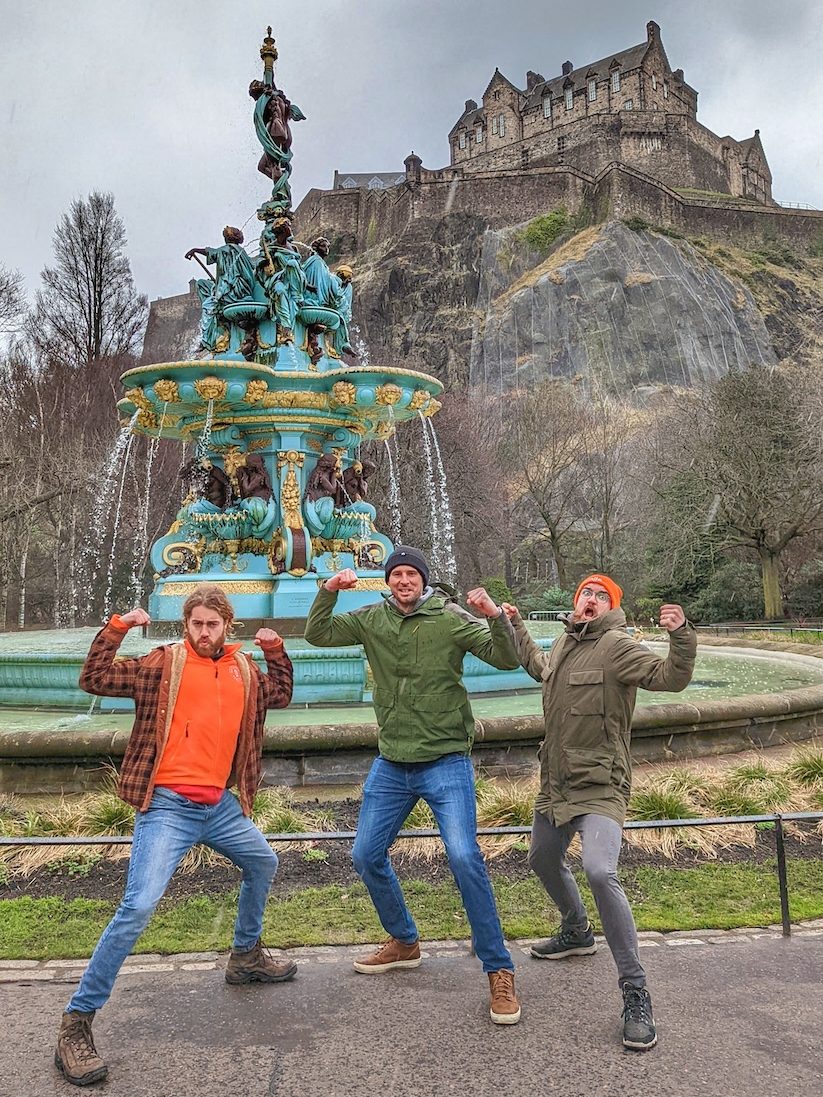 Best of UK & Ireland tour review - Tour Guides posing silly in front of Ross Fountain beneath Edinburgh Castle