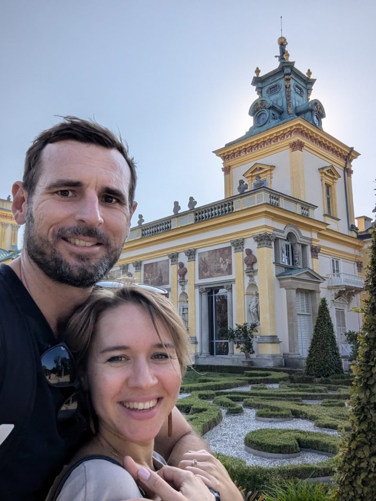 A couple enjoys Wilanow Palace in Warsaw